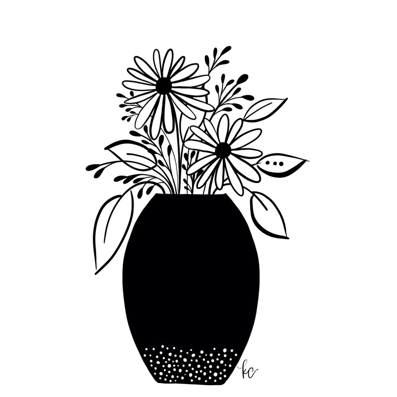 pretty black and white flowers in a vase